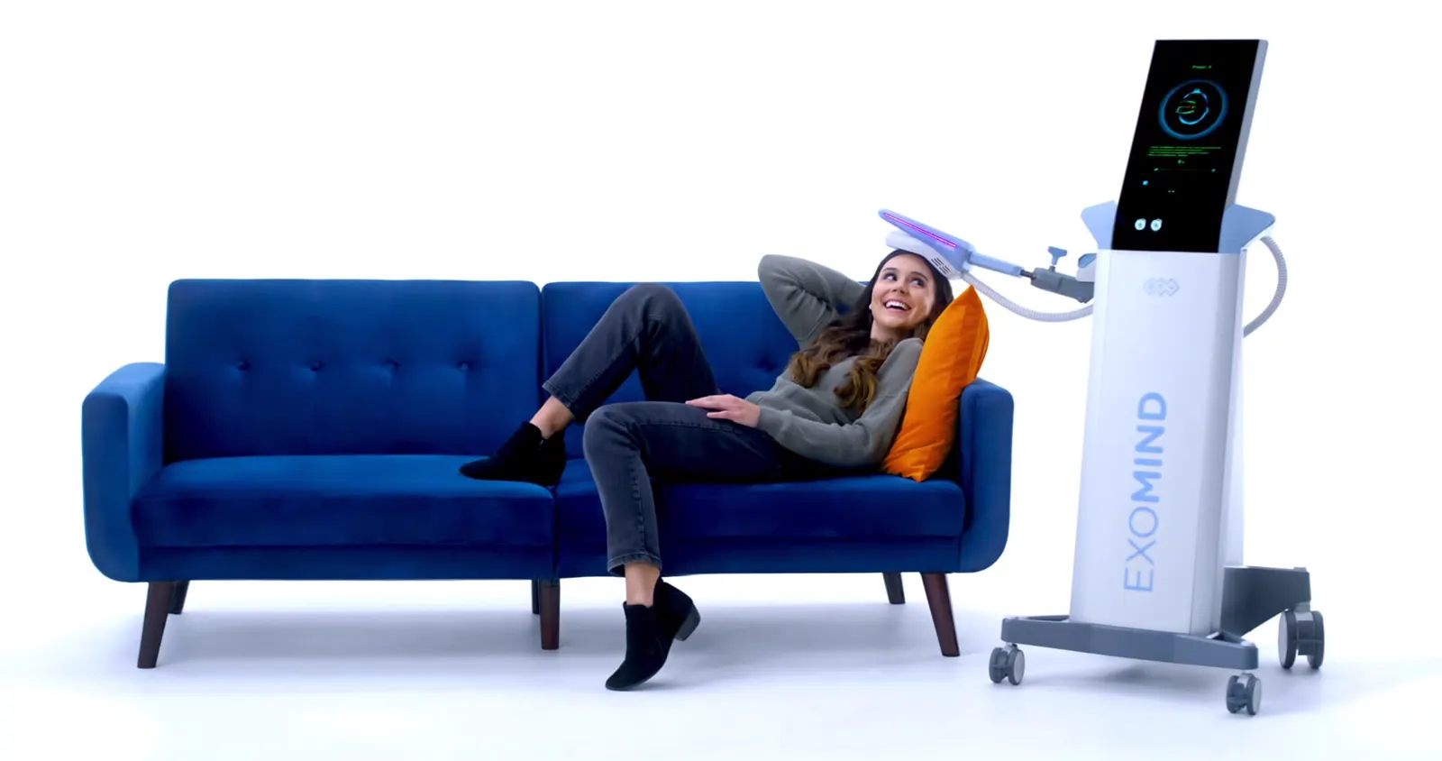 Woman comfortably seated during an EXOMIND TMS session